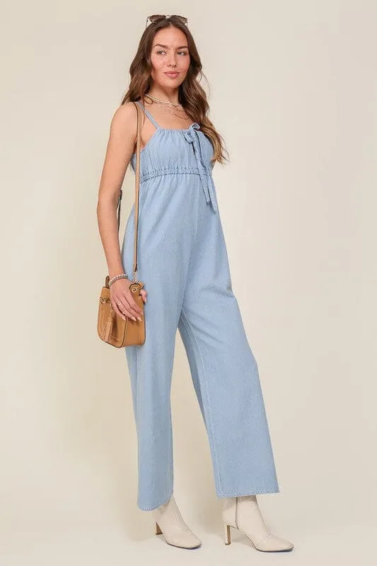 DENIM BLUE SLEEVELESS JUMPSUIT WITH SELF FRONT TIE