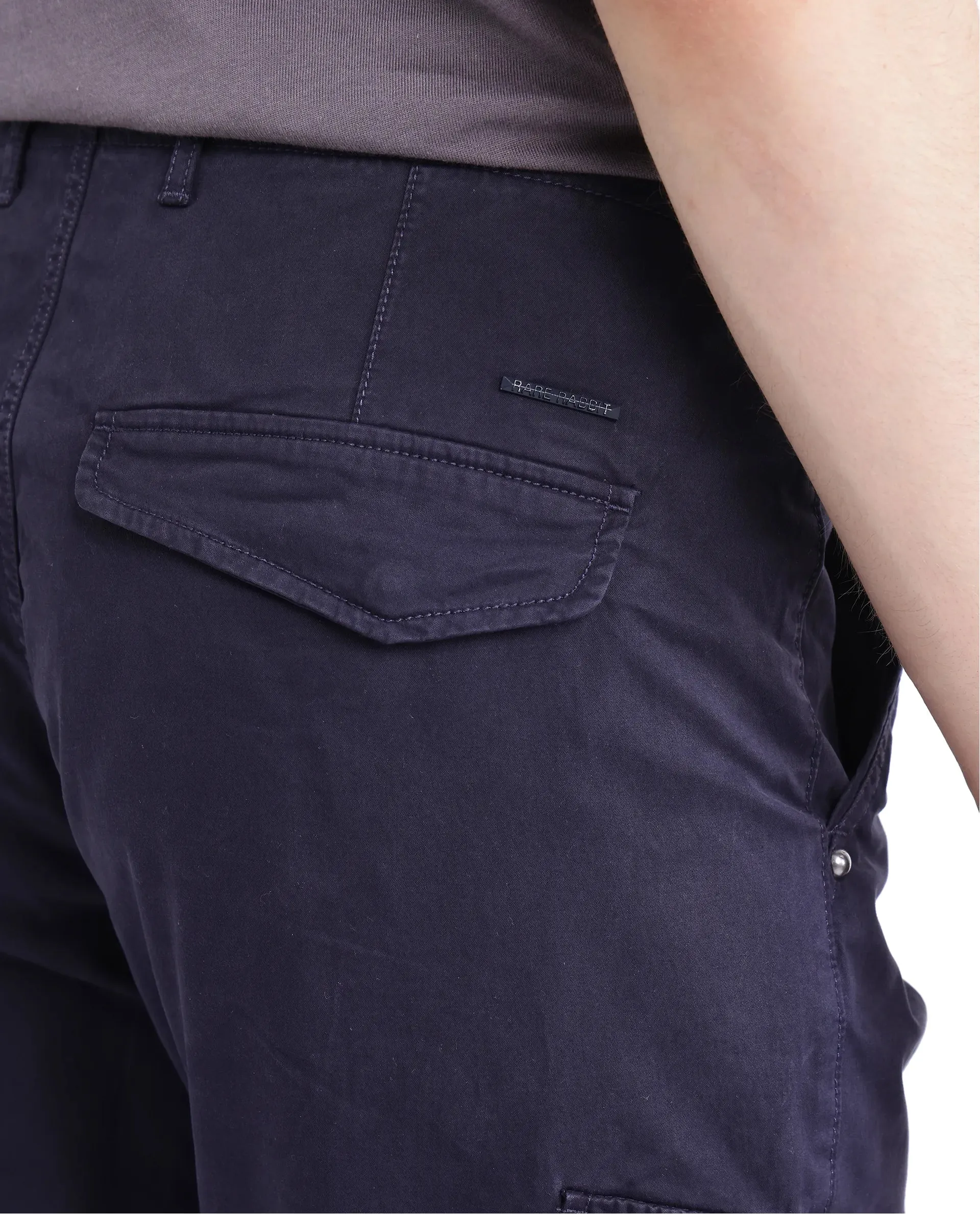 Rare Rabbit Men Ceder-1 Dark Navy Button and Zip Closure Multi-Pocket Plain Cargo Trouser